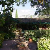 Rose Tree Inn Sedona logo