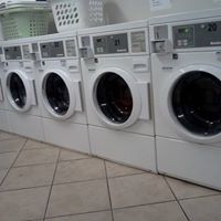 Wash N Fluff Coin Laundry logo