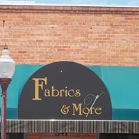 Fabrics & More logo