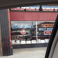 Jim & Jenni's Quality Tattoos logo
