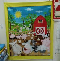 Stitch N Quilt Fabrics logo