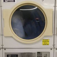 Courtesy Coin-Op Laundry logo