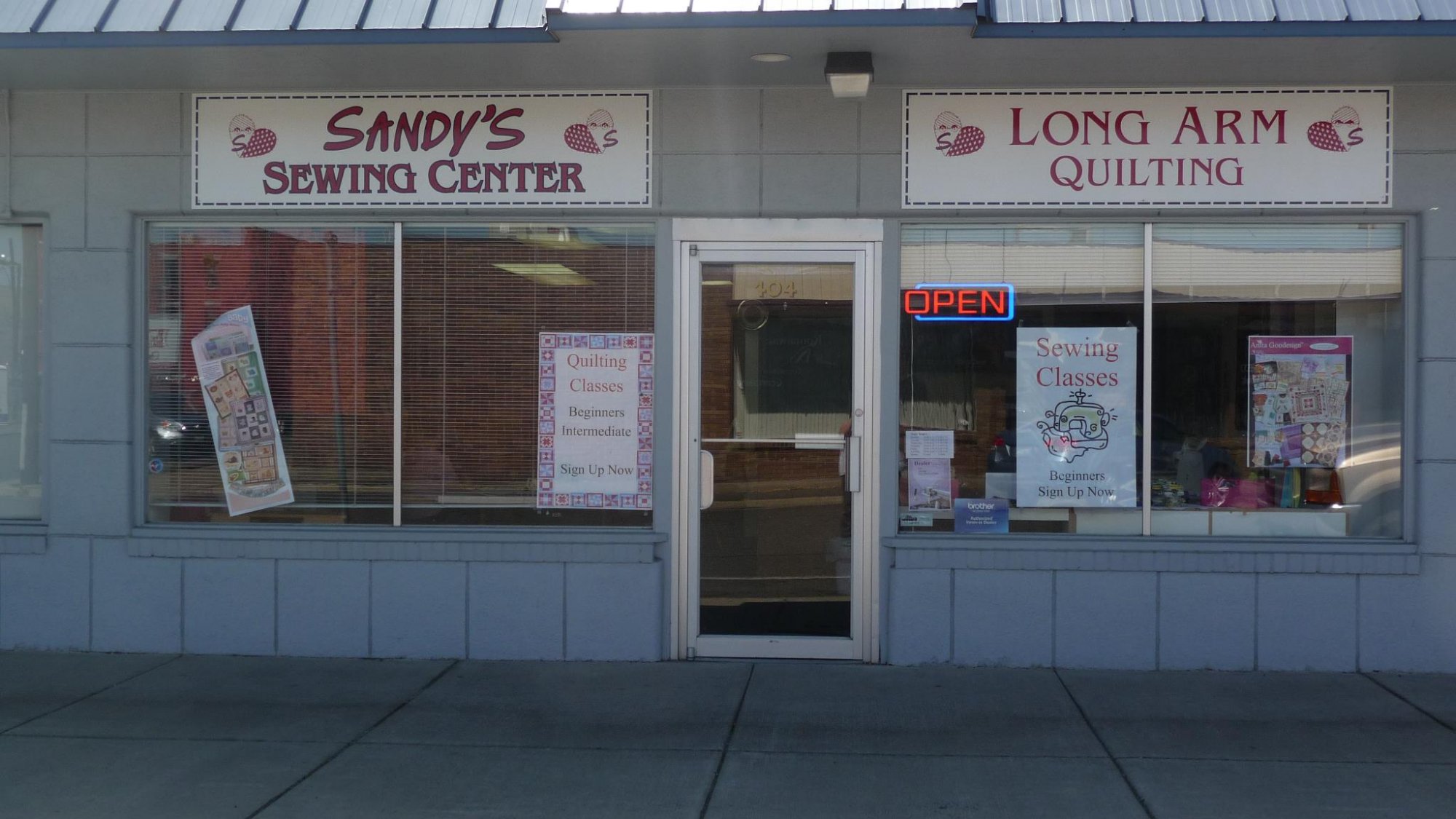 Sandy's Sewing Center logo