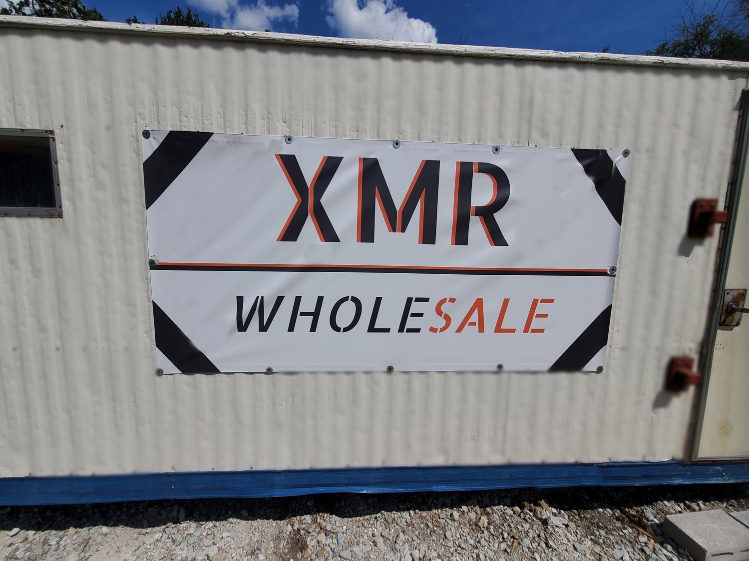 Xmr Wholesale logo
