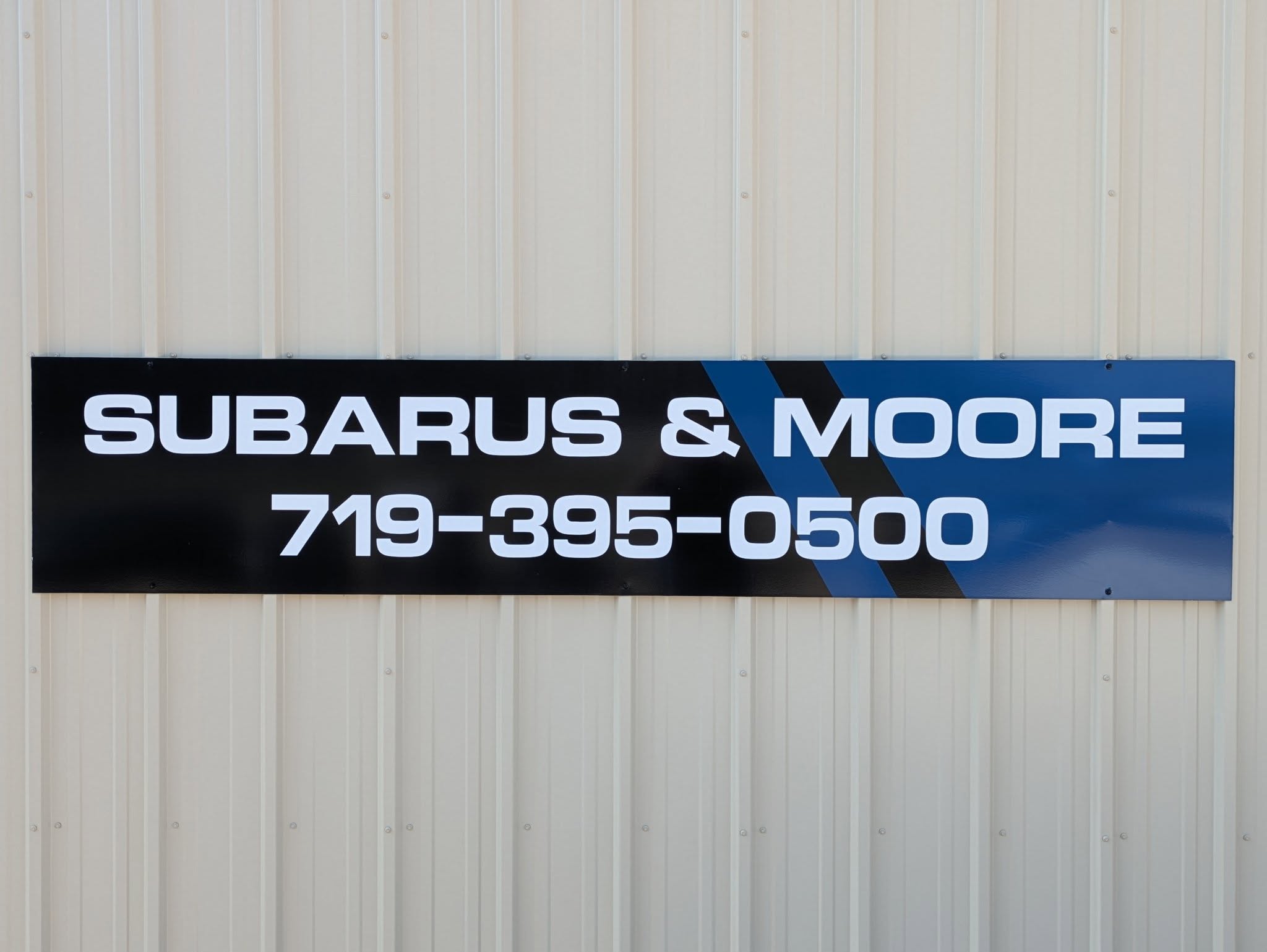 Subaru's & Moore logo