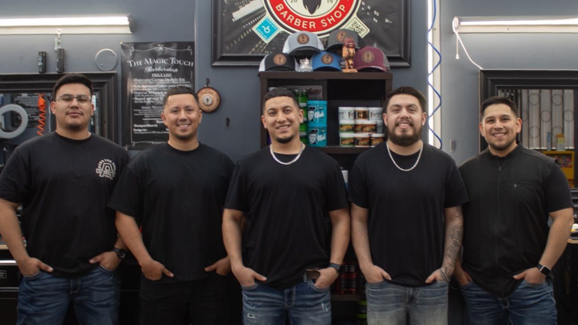The MagicTouch Barbershop logo